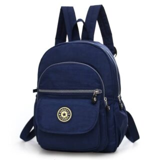 Small backpack in blue nylon with white background