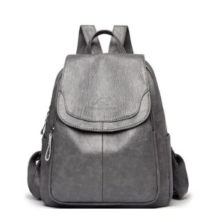 Grey sheepskin leatherette backpack for women with a white background