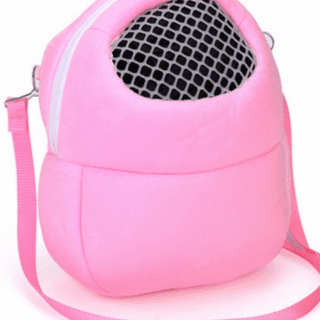 Small pink animal carrier bag with white background