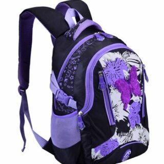 Sac à dos fille coloré motif papillon violet et noir avec un fond blanc