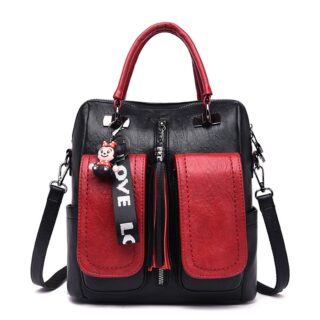 Sac à dos Vintage en simili cuir souple noir et rouge avec un fond blanc