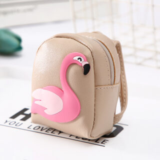 Mini backpack for women with pink and beige flamingo pattern and white background and accessories