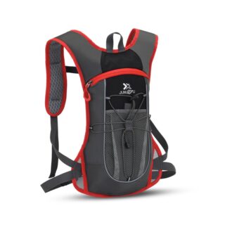 Sac à dos ultraléger pour le ski et les sports d'hiver gris et rouge avec un fond blanc