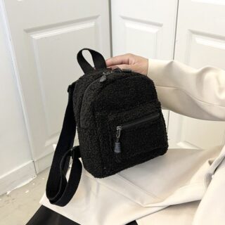 Black muslin backpacks with white door bottoms