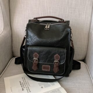 Vintage black leatherette backpack with beige seat bottom