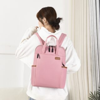 Waterproof backpack for business women carried by a woman in a house