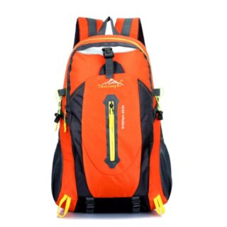 Large orange ski backpack with white background