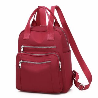 Large capacity travel backpack in solid red with white background