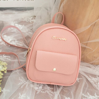 Polyester leather mini backpack in solid pink with a lace bottom