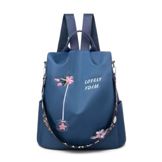 Women's blue flower embroidered backpack with white background