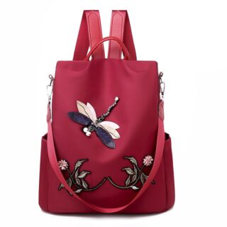 Women's red flower and butterfly embroidered backpack with white background