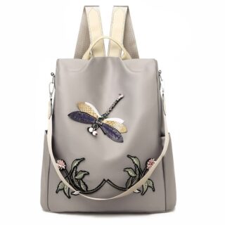 Women's beige and grey flower and butterfly embroidered backpack with white background