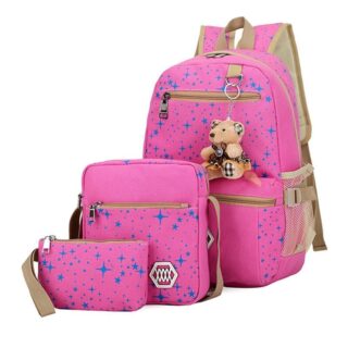 Backpack with star pattern and pink bear pendant on a white background