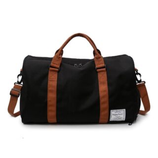 Large travel bag with brown shoulder strap