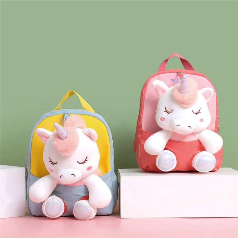 Two backpacks with sleeping unicorns