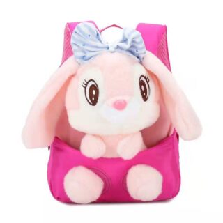 Pink backpack with big-eared rabbit plush